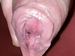 Dripping cumshot out of long foreskin after edging