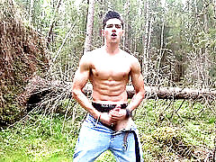 Gay stud jerking off outdoors showing off his six-pack