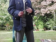 Military officer enjoys smoking his pipe and getting off