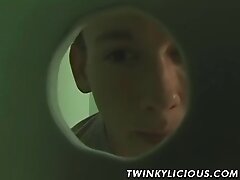 'Young pale guy sucks cock through glory hole after wanking'